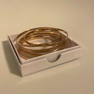 8 piece gold bangle set from Amazon. Different patterns.
